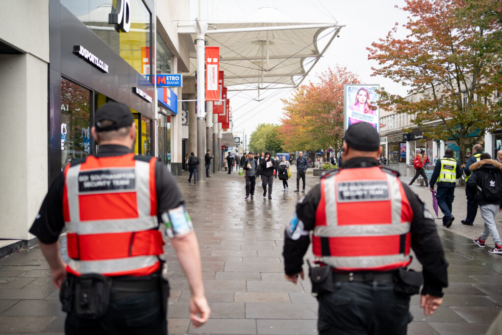 Two GO! Southampton security guards patrolling Above Bar precinct in Southampton City Centre